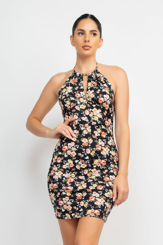 Halter Neck Cutout Ditsy Bodycon Dress A knit geek chic fashionable dress in an all-over ditsy floral print featuring a halter neckline, cutout detail, open back, bodycon silhouette, and a mini length,